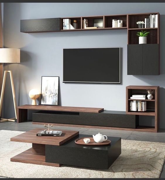 مجموعة تحتوى على وحدة تلفزيون مصنوعة من خشب mdf عالي الجوده مكونه من درج و ضلفه قلاب و مكتبه و جزء علوي يشمل ضلفتين أسود وبني - 240*40*40 سم وترابيزة قهوة - بيكي Set27