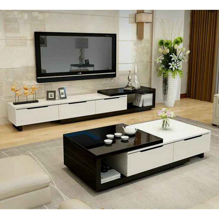 مجموعة تحتوى على وحدة تلفزيون مصنوعة من خشب mdf عالي الجوده مكونه من 3 درج - أسود و أبيض -120*60*35 سم وترابيزة قهوة - بيكي Set29